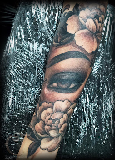 Find tattoos ideas for mothers for your next unique tattoo in Houlton at Crowes Tattoos