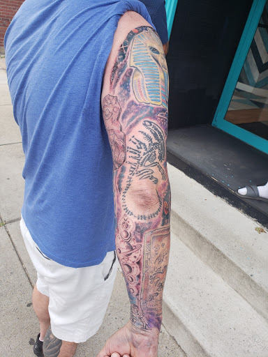 Explore cover up tattoos ideas forearm, creative tattoo ideas in Buffalo, available at Madd Ink Tattoo & Piercing