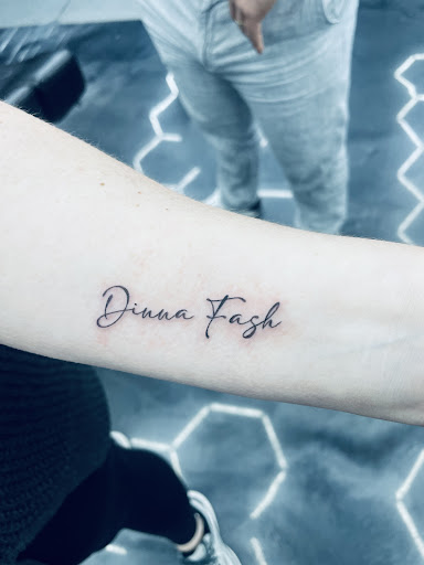 Explore dog paw print tattoo ideas, creative tattoo ideas in Hollywood, available at Sacred Eye Tattoos