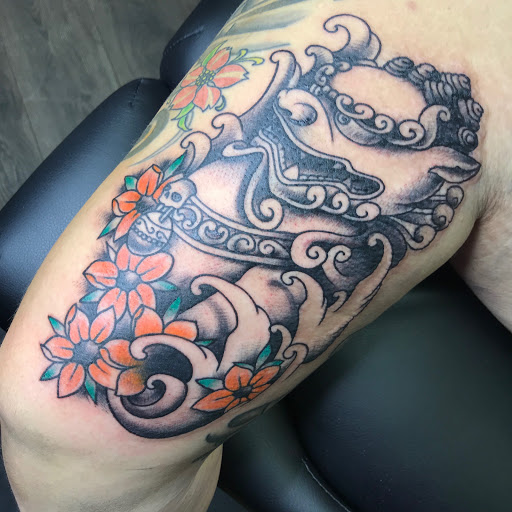 Explore tattoo flag ideas, creative tattoo ideas in Sanford, available at Hudson & Company Tattoo Studio