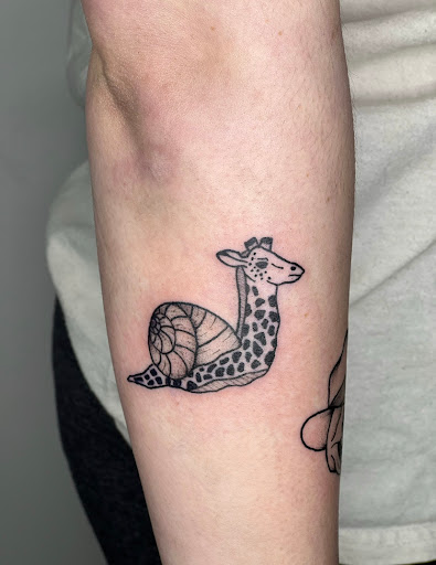 Explore peony tattoo ideas, creative tattoo ideas in Milwaukee, available at The Skin Museum