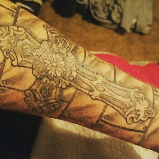 Explore themed sleeve tattoo ideas, creative tattoo ideas in Menomonee Falls, available at Color Bomb Tattoo Shop and Body Piercing