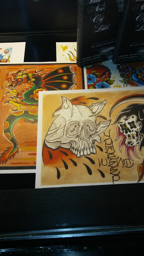 Find lion hand tattoo ideas for men for your next unique tattoo in Albuquerque at Por Vida Tattoo