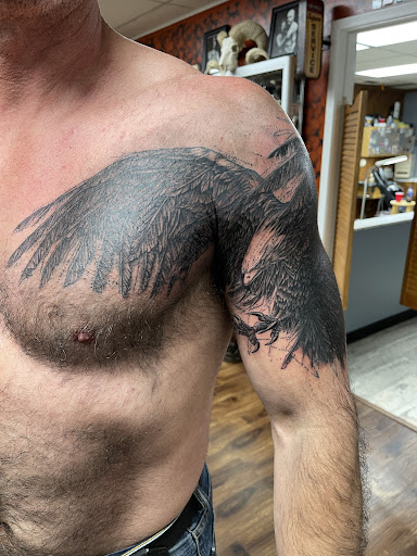 Explore blackout cover up tattoo ideas, creative tattoo ideas in Des Moines, available at Skin Kitchen Tattoo