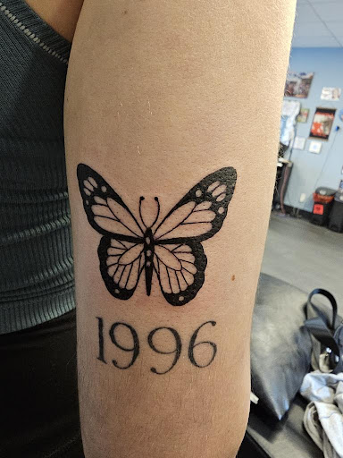Explore travel adventure tattoo ideas, creative tattoo ideas in Palm Harbor, available at Angry Owl Tattoo and Piercing