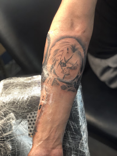 Explore cover up tattoo ideas on hand, creative tattoo ideas in Rochester, available at Forest Ink Tattoos