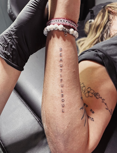 Explore small wrist tattoo cover up ideas, creative tattoo ideas in Burley, available at Fine Line Ink