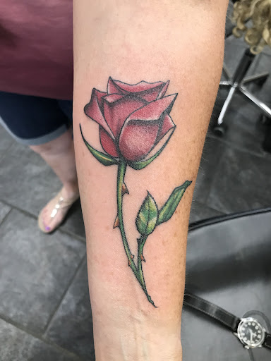 Explore breastfeeding tattoos ideas, creative tattoo ideas in San Marcos, available at Locally Famous Tattoo