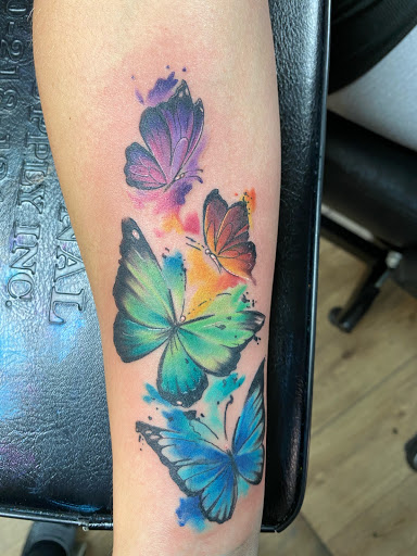 Explore tattoo ideas for cousins, creative tattoo ideas in Jefferson, available at Slammin Ink Tattoo