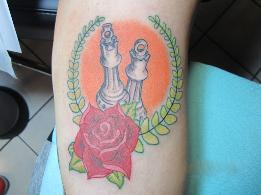 Explore dad daughter tattoo ideas, creative tattoo ideas in Foley, available at Black Sheep Custom Tattoos and Piercings