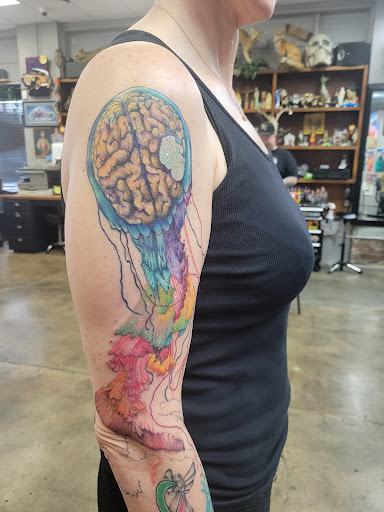 Explore half sleeve family tattoo ideas, creative tattoo ideas in Wichita, available at Artist At Large Tattoo