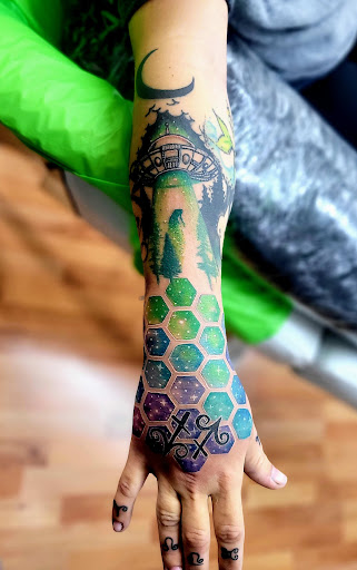 Explore cover up tattoo ideas for women, creative tattoo ideas in Benton, available at Spectrum Tattoo