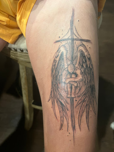 Explore ezra tattoo ideas, creative tattoo ideas in Magnolia, available at Lucky Sparrow Tattoo Shop and Piercing