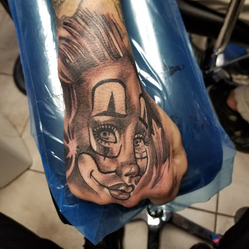 Tattoo Shop «Infamous Tattoos», reviews and photos, 5330 Old National Hwy, College Park, GA 30349, USA