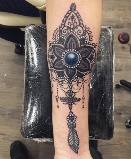 Explore dog paw print tattoo ideas, creative tattoo ideas in Anchorage, available at Unique Ink AK