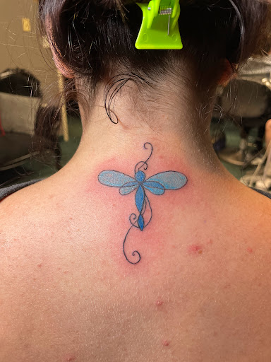 Explore upper arm men tattoo ideas, creative tattoo ideas in Middletown, available at Orange County Tattoo & Body Piercing Studio