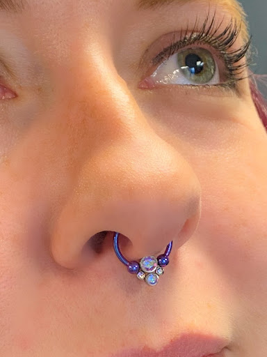 Explore toothless tattoo ideas, creative tattoo ideas in Springfield, available at Body Piercing By Qui Qui