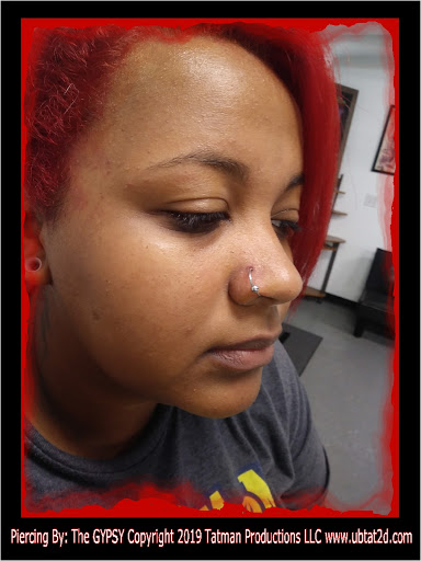 Explore snail tattoo ideas, creative tattoo ideas in Topeka, available at Artist Alley Studio Tattoos & Piercings