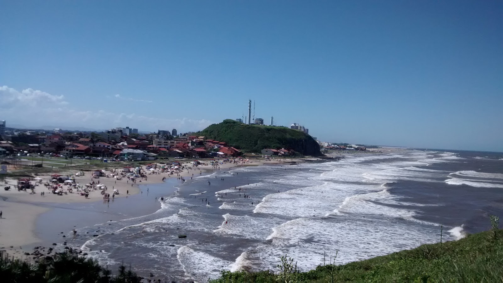 Foto van Cal Strand ondersteund door kliffen