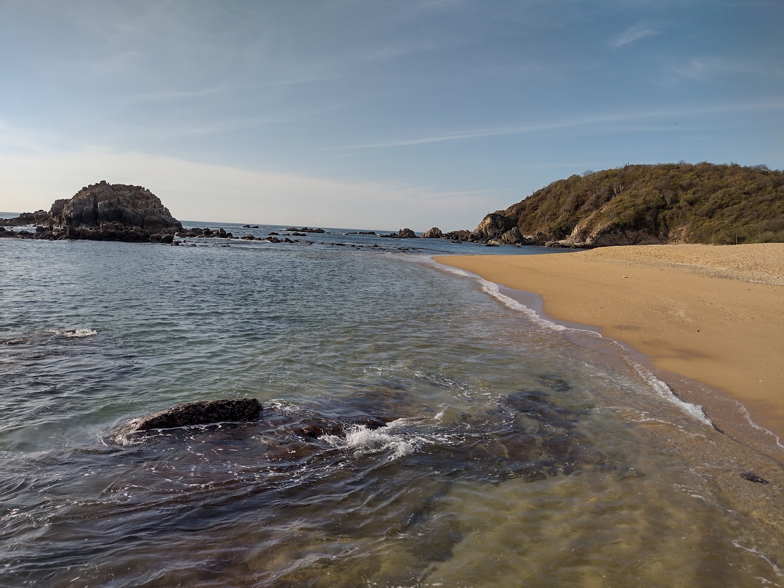 Fotografie cu Magueyito beach cu o suprafață de apa pură turcoaz