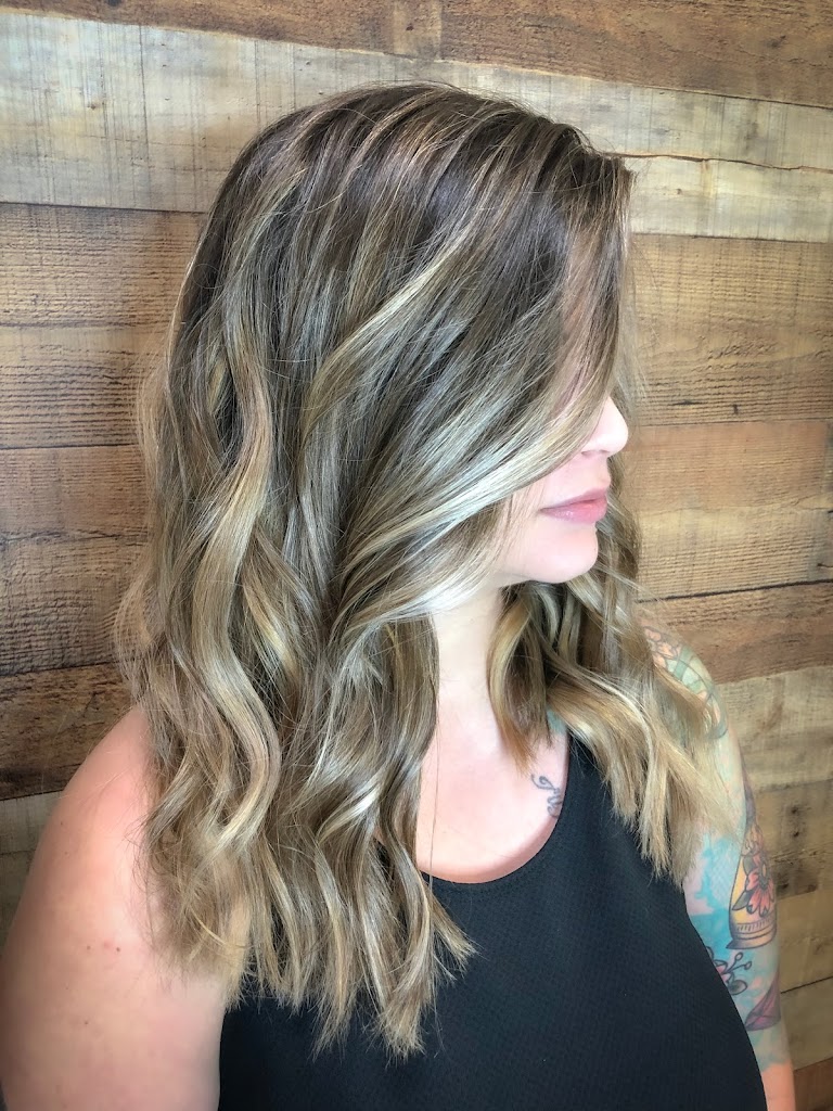 Hair Den & Boutique 27055