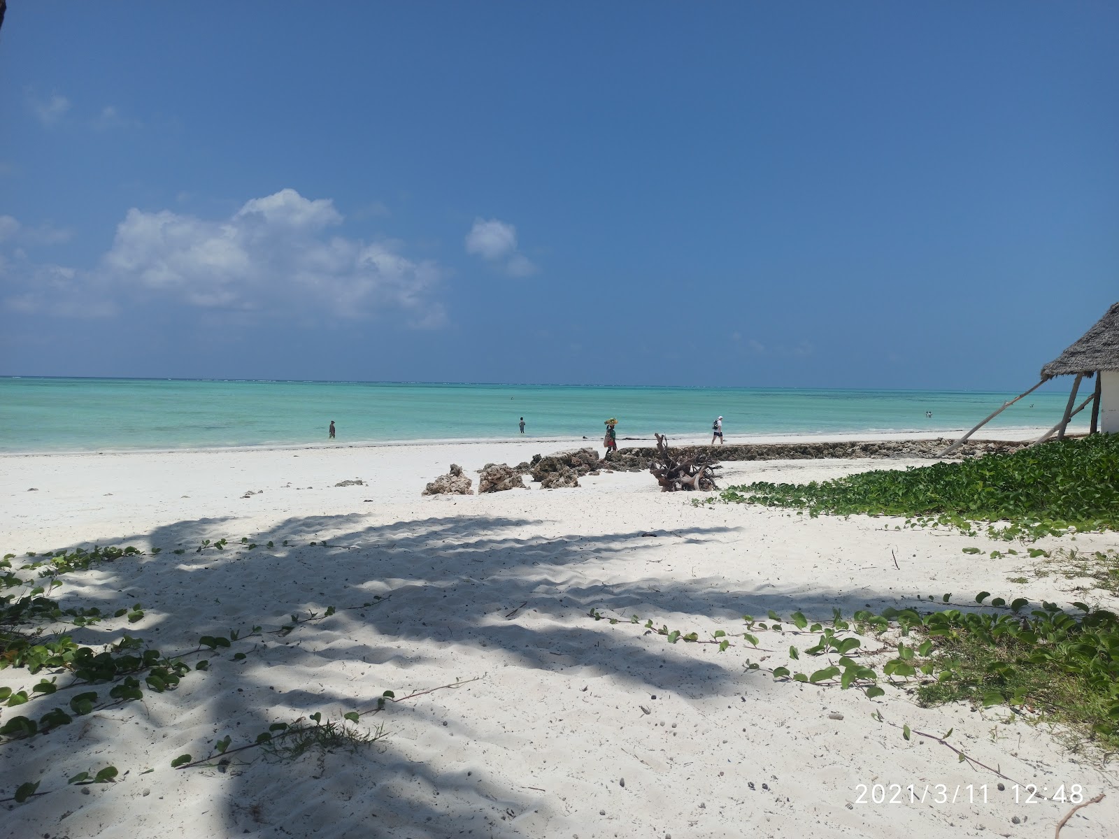 Photo of Paje Beach with blue pure water surface