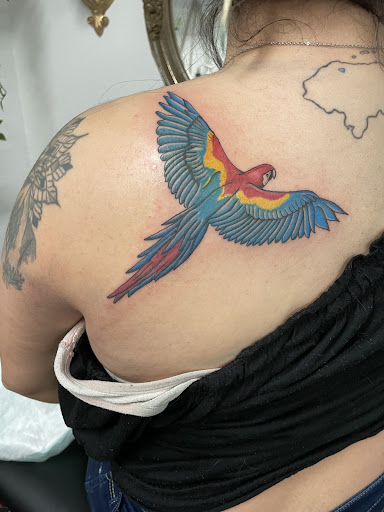 Explore above knee tattoo ideas, creative tattoo ideas in Brandon, available at Forever Yours Tattoo and Piercing