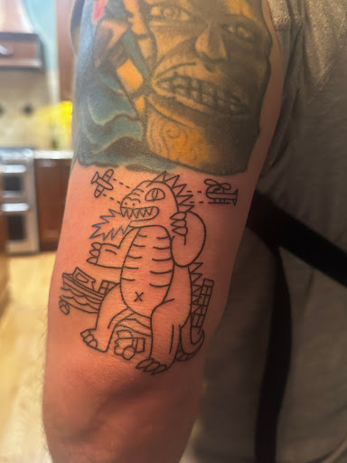 Explore back flower tattoo ideas, creative tattoo ideas in Lake Villa, available at Eternal Tiger Tattoo