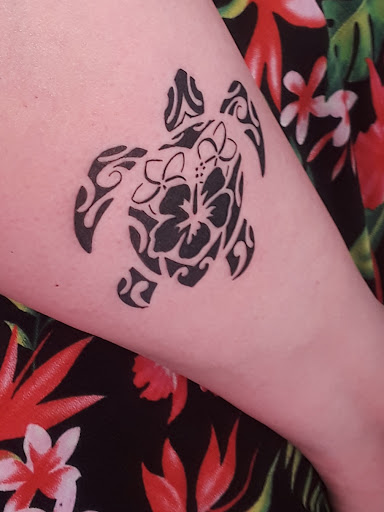 Explore ouroboros tattoo ideas, creative tattoo ideas in Kihei, available at Maui Tattoo Company