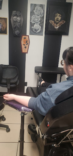 Explore cherub tattoo ideas, creative tattoo ideas in Normal, available at Smokin Aces Tattoo Company