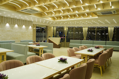 Grand Dinner Bell Restaurant & Banquet - 1st Floor Akshar Arcade, Opp Memnagar Fire Station, Ahmedabad, Gujarat 380009, India