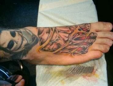 Explore domino tattoo ideas, creative tattoo ideas in Madison, available at Archangel Tattoo & Piercing