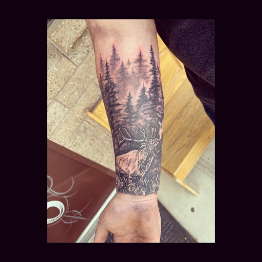 Explore cool thigh tattoo ideas, creative tattoo ideas in Elko, available at Freedom Tattoo