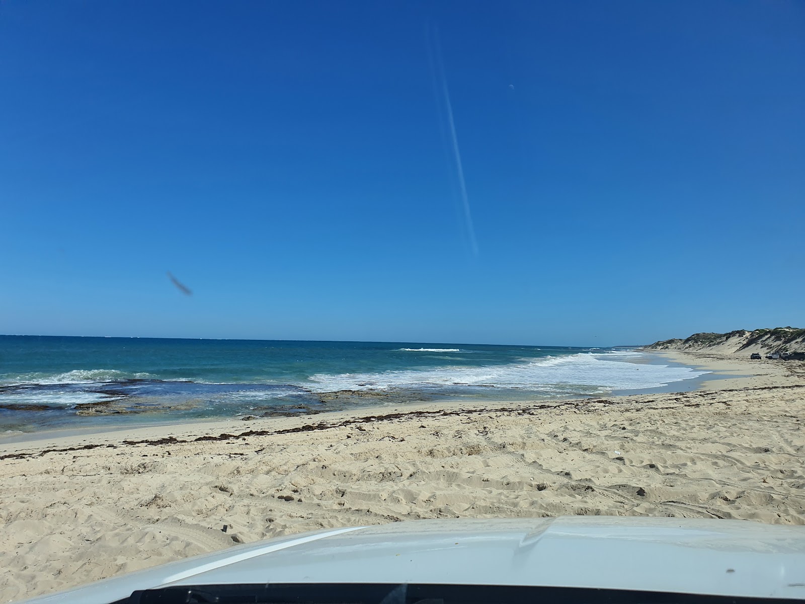 Foto de Wilbinga Shacks Beach com areia bege superfície