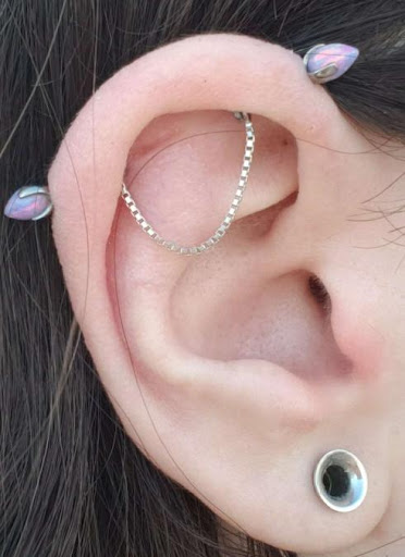 Explore christian tattoo ideas for females, creative tattoo ideas in Hawthorne, available at Pleasurable Piercings, Inc.