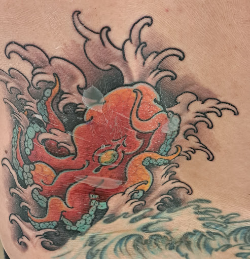 Explore name cover up tattoo ideas for men, creative tattoo ideas in Kapolei, available at Sacred Art Tattoo and Coffee Bar - Kapolei