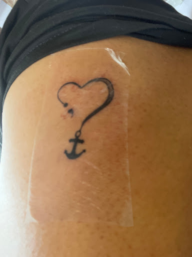 Explore cover up ideas for name tattoos, creative tattoo ideas in Albany, available at Dreads Touch