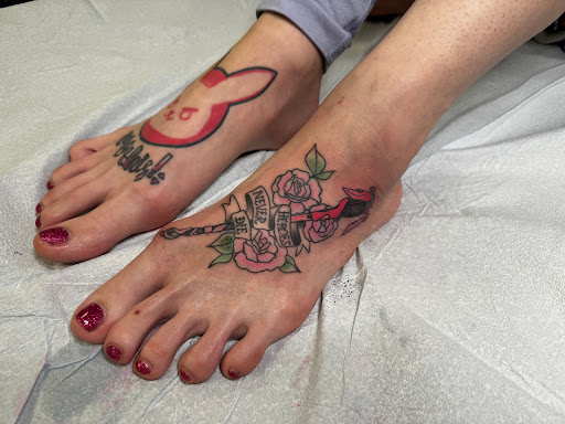 Explore nike tattoo ideas, creative tattoo ideas in Oviedo, available at Fine Ink Studios Tattoos