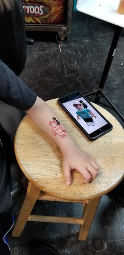 Explore filler ideas for sleeve tattoos, creative tattoo ideas in Council Bluffs, available at Lil Bros Tattoo