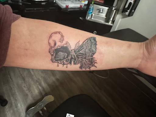 Explore scoliosis tattoo ideas, creative tattoo ideas in Jonesboro, available at Immortal Ink