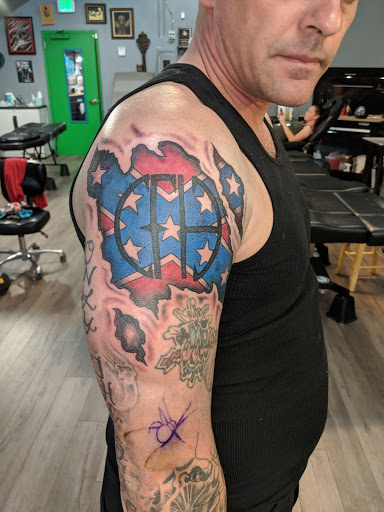 Explore tattoo filler ideas for guys, creative tattoo ideas in Cheyenne, available at The T.R.I.B.E. Zoo, LLC Tattoo