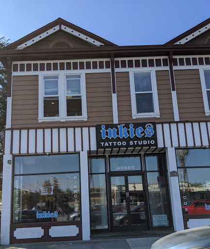Explore tattoo ideas for belly, creative tattoo ideas in Fremont, available at Inkies Tattoo Studio