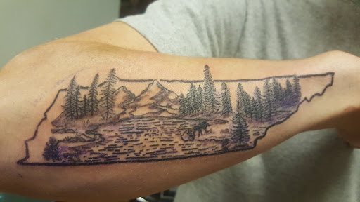 Explore tattoo flag ideas, creative tattoo ideas in Owensboro, available at BnB Tattoos & Piercings