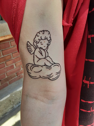 Explore small patchwork tattoo ideas, creative tattoo ideas in Meadville, available at Lucky Lucys Tattoo and Art Studio