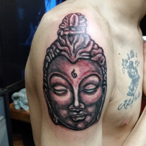 Explore thumb tattoo ideas, creative tattoo ideas in Erie, available at EliKingInk