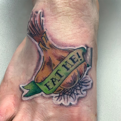 Explore skull and crossbones tattoo ideas, creative tattoo ideas in Hayward, available at Three Tentacles Tattoo Studio