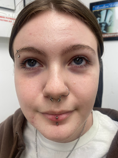 Explore calla lily tattoo ideas, creative tattoo ideas in Myrtle Beach, available at Professional Body Piercing by Jackie