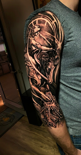 Explore biceps tattoo ideas, creative tattoo ideas in Austin, available at Lost Edge Tattoo
