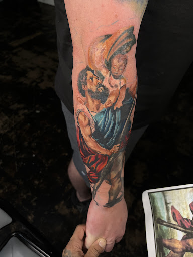 Explore upper arm tattoo ideas for females, creative tattoo ideas in Arlington, available at Pistol Petes Tattoo Saloon