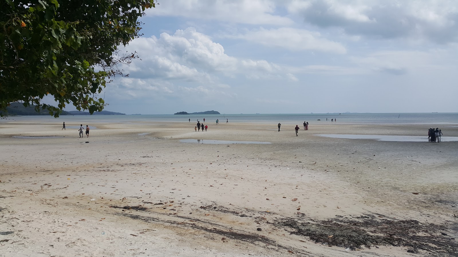 Foto af Tiga Putri Beach og bosættelsen